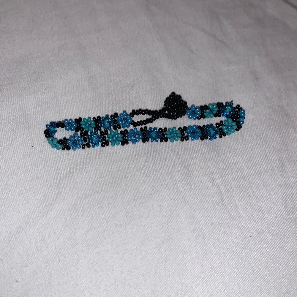 Blue and black beaded flower bracelet